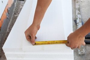 Seattle Home Inspection a man measuring