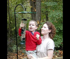 kids and mom feeding birds