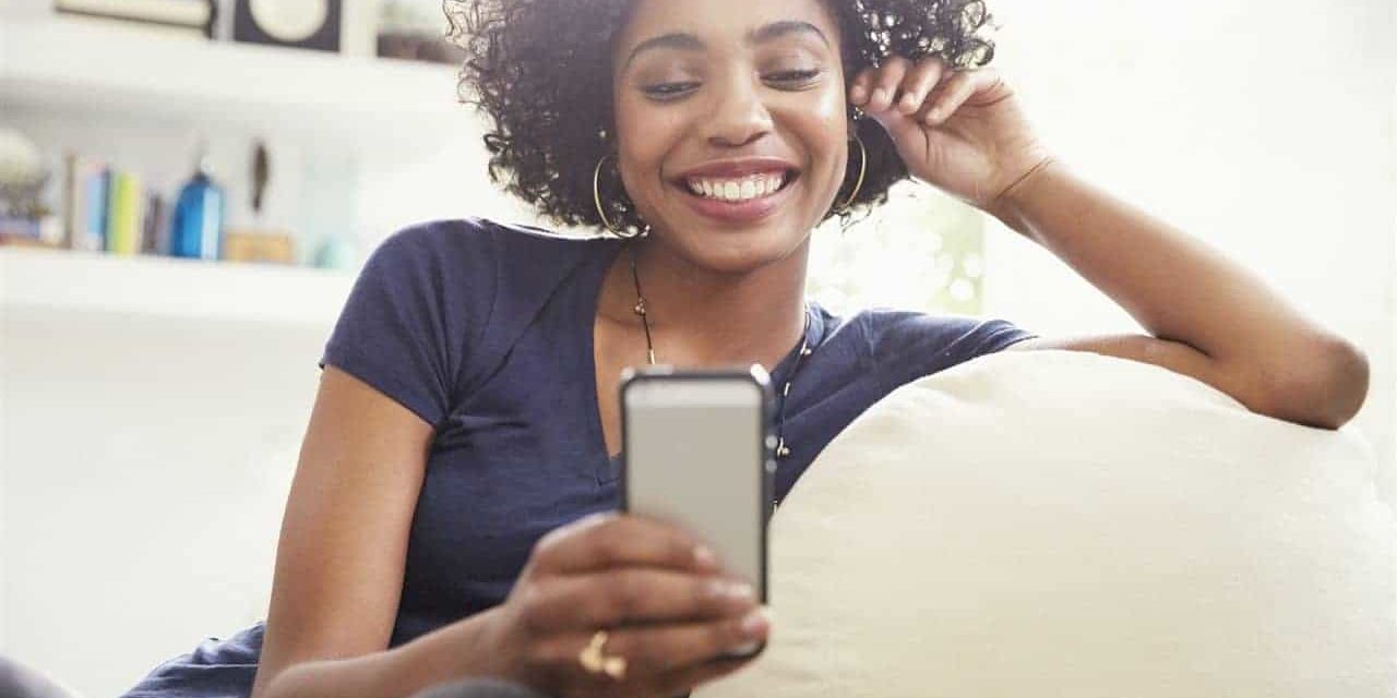 1034772643 woman with her phone